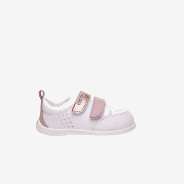 Deportivos respetuoso de niña con velcro y puntera reforzada en blanco y rosa.