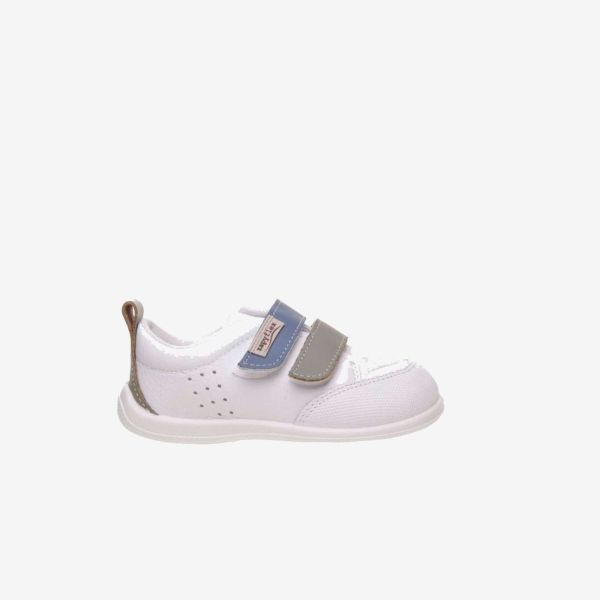 Deportivos respetusos primeros pasos con velcro y puntera reforzada en blanco con tiras en azul y verde.